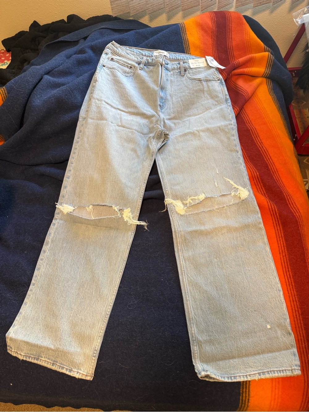Abercrombie & Fitch “The 90s Relaxed” Jean. Light Wash Distressed